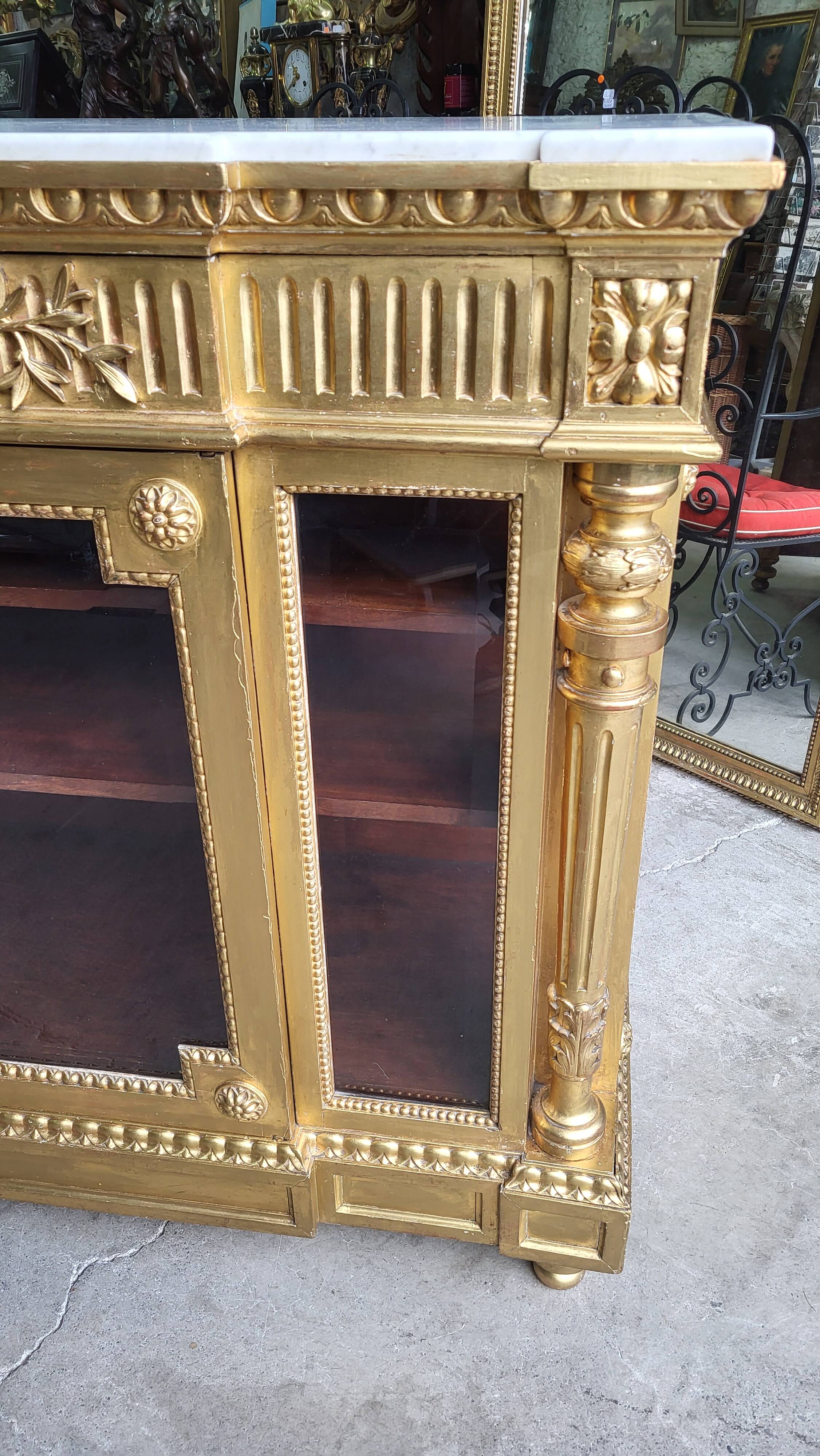 Louis xvi display cabinet in gilded wood