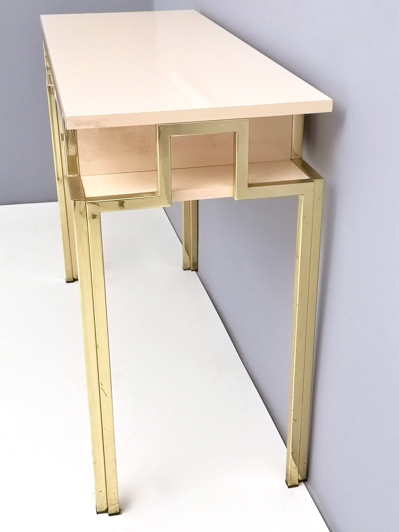 Postmodern pale pink formica and brass console with wall mirror, italy