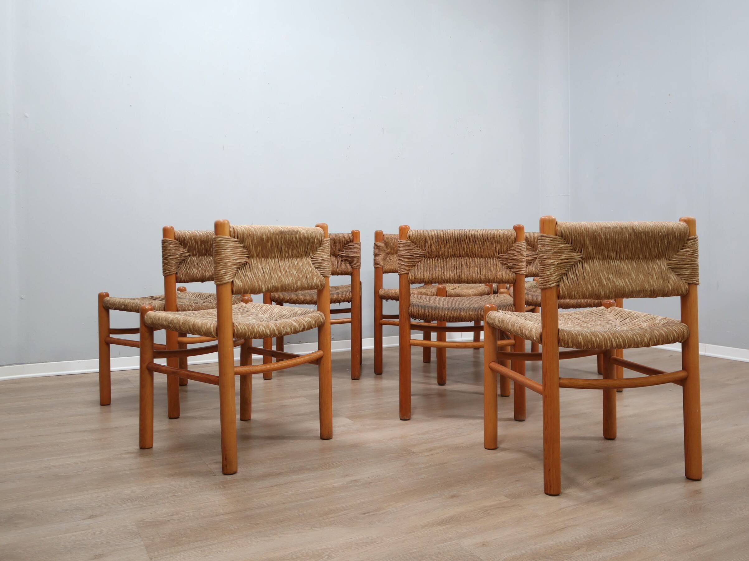 Set of 8 chairs 1960s Charlotte Perriand Style woven straw & wood