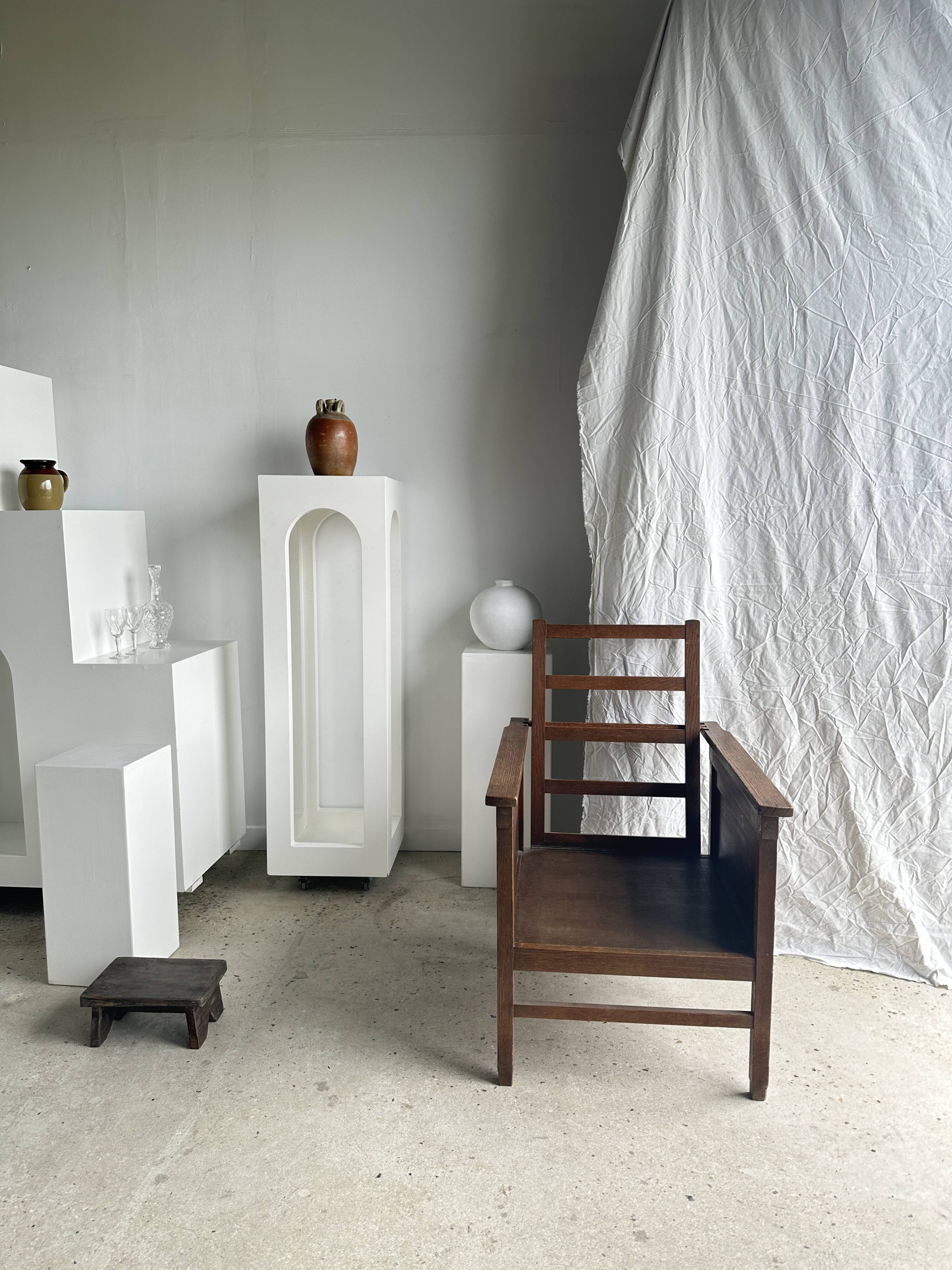 Large wooden armchair with adjustable reclining back