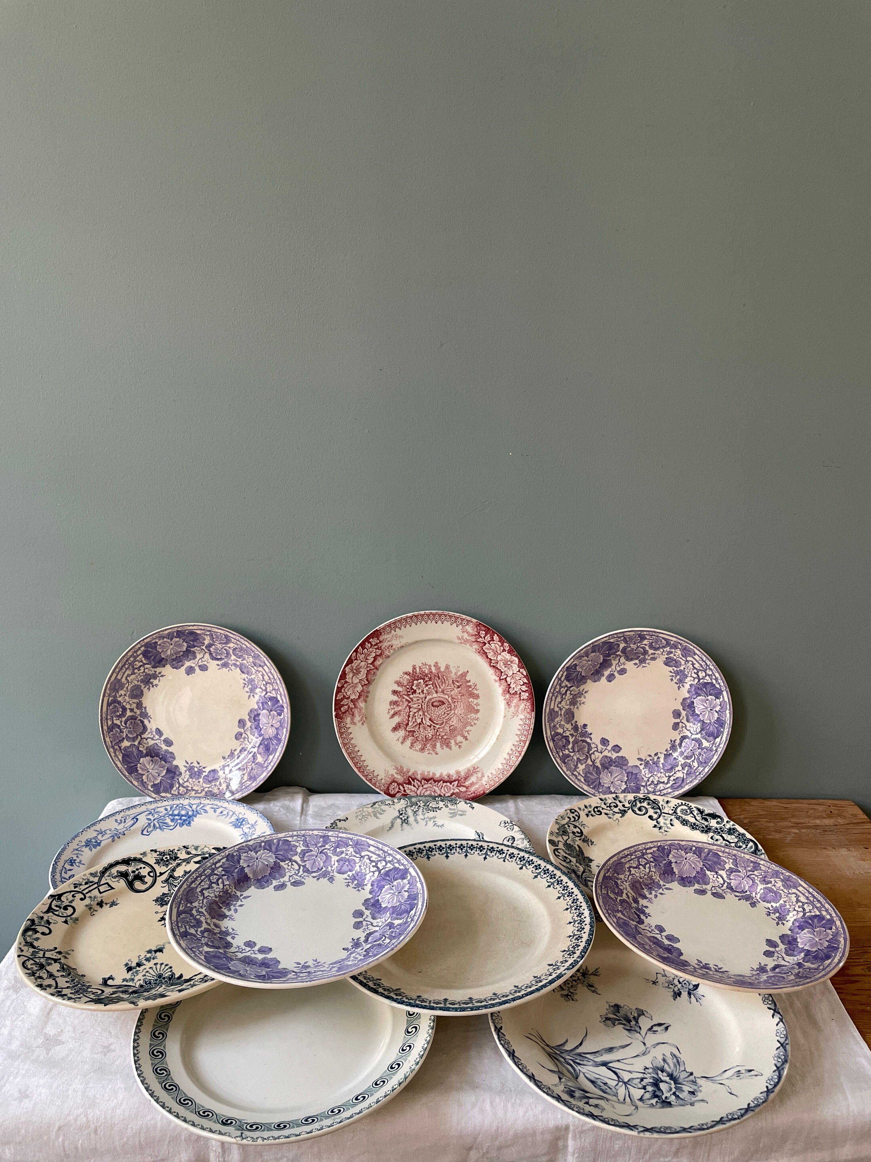 Series of 12 mismatched Terre de Fer dessert plates
