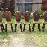 Brutalist rustic vintage chairs in solid oak. ( Series of 6 )