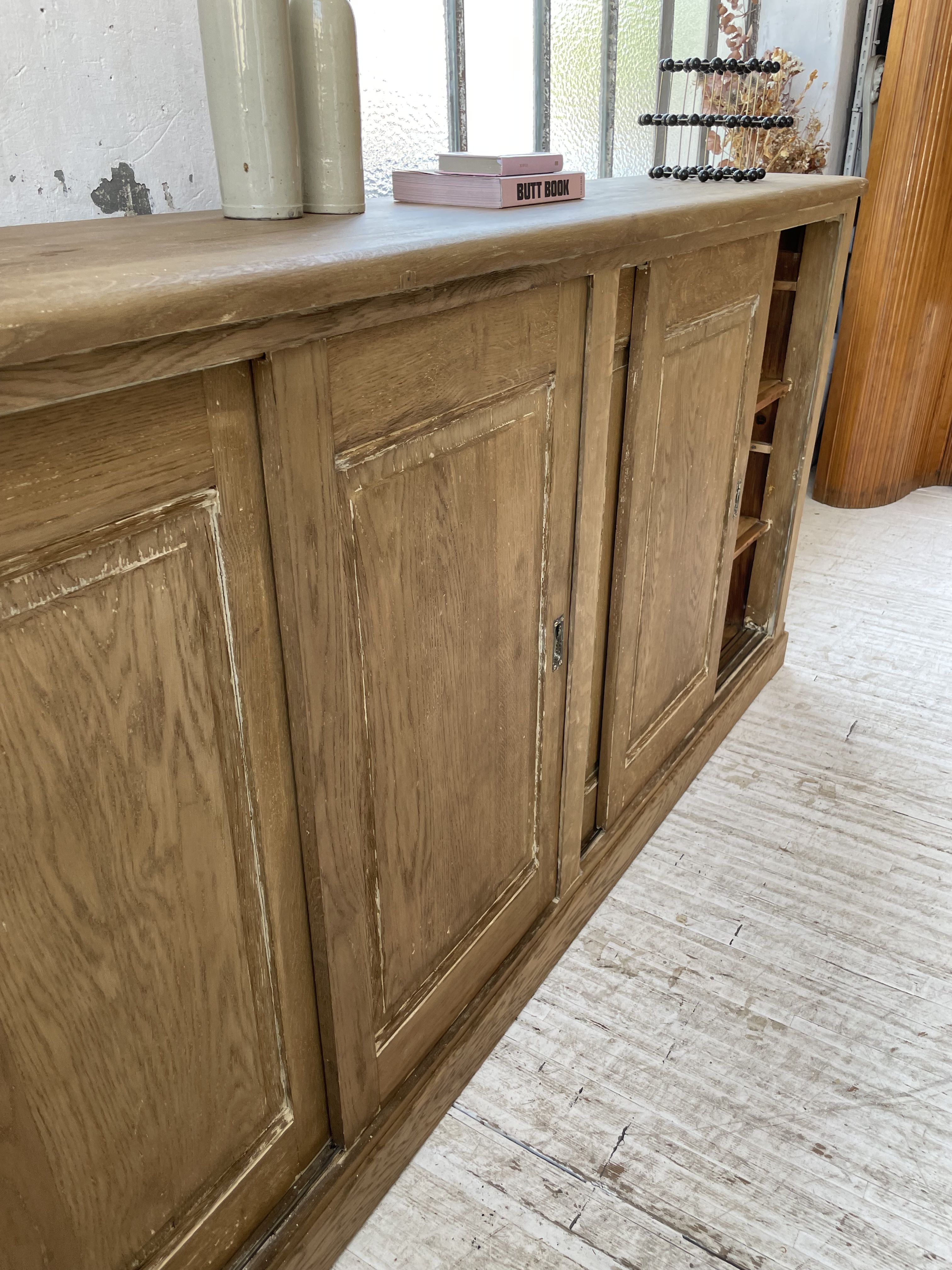 Large row of solid oak loom sliding doors