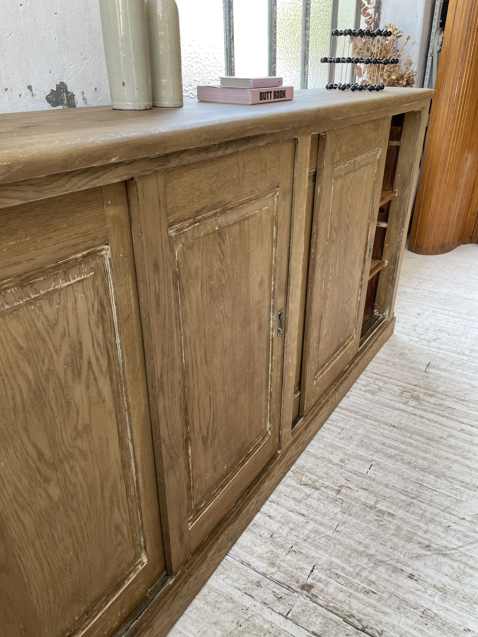 Large row of solid oak loom sliding doors