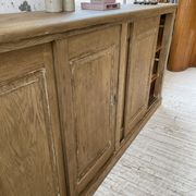 Large row of solid oak loom sliding doors