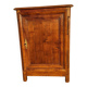Furniture with a cherry wood door.