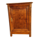Furniture with a cherry wood door.