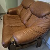 Vintage Scandinavian two-seater sofa in cognac leather and solid oak.