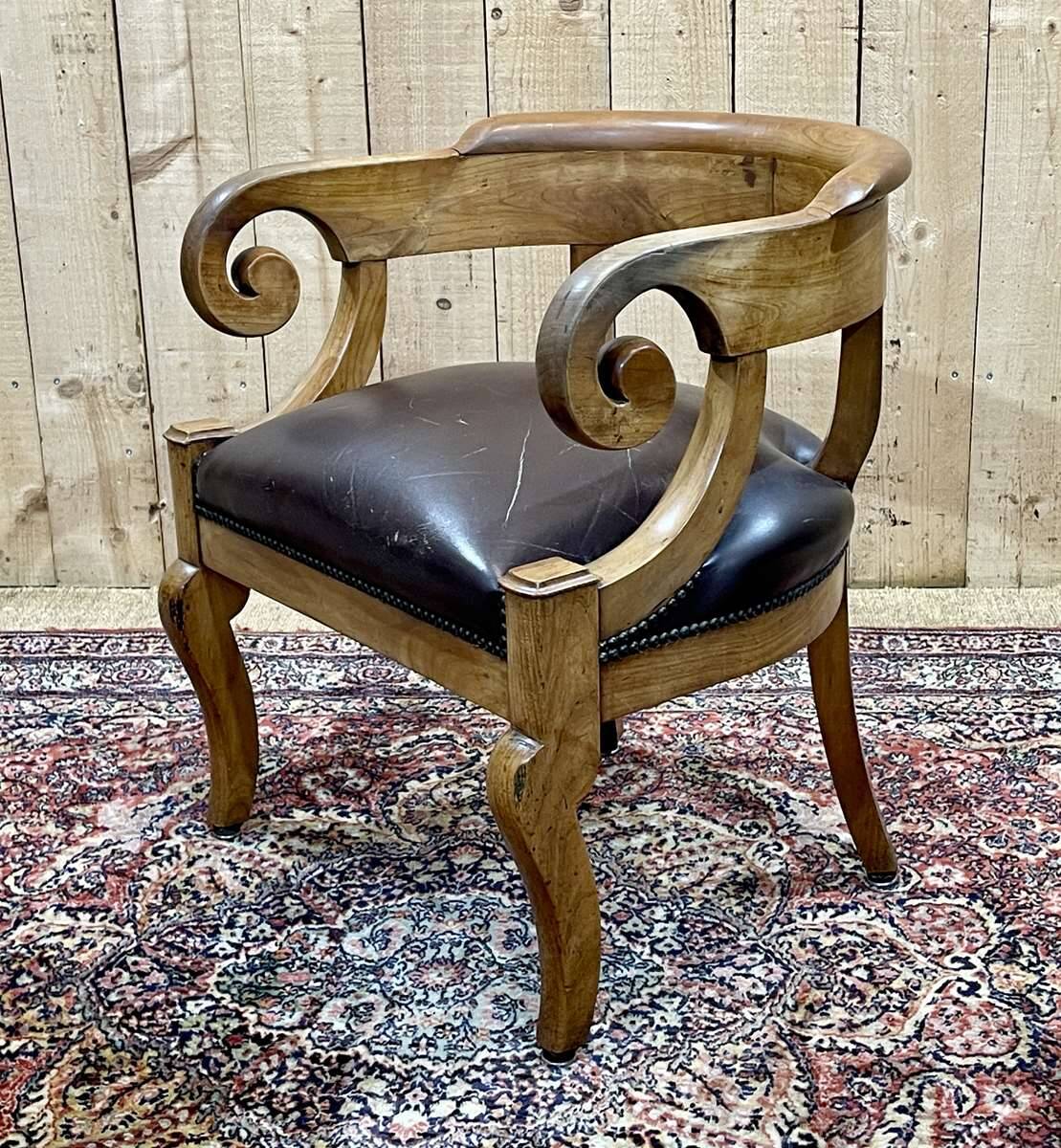 19th century French armchair in cherry wood and leather seat
