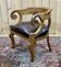 Fauteuil français du XIXème en merisier et assise cuir