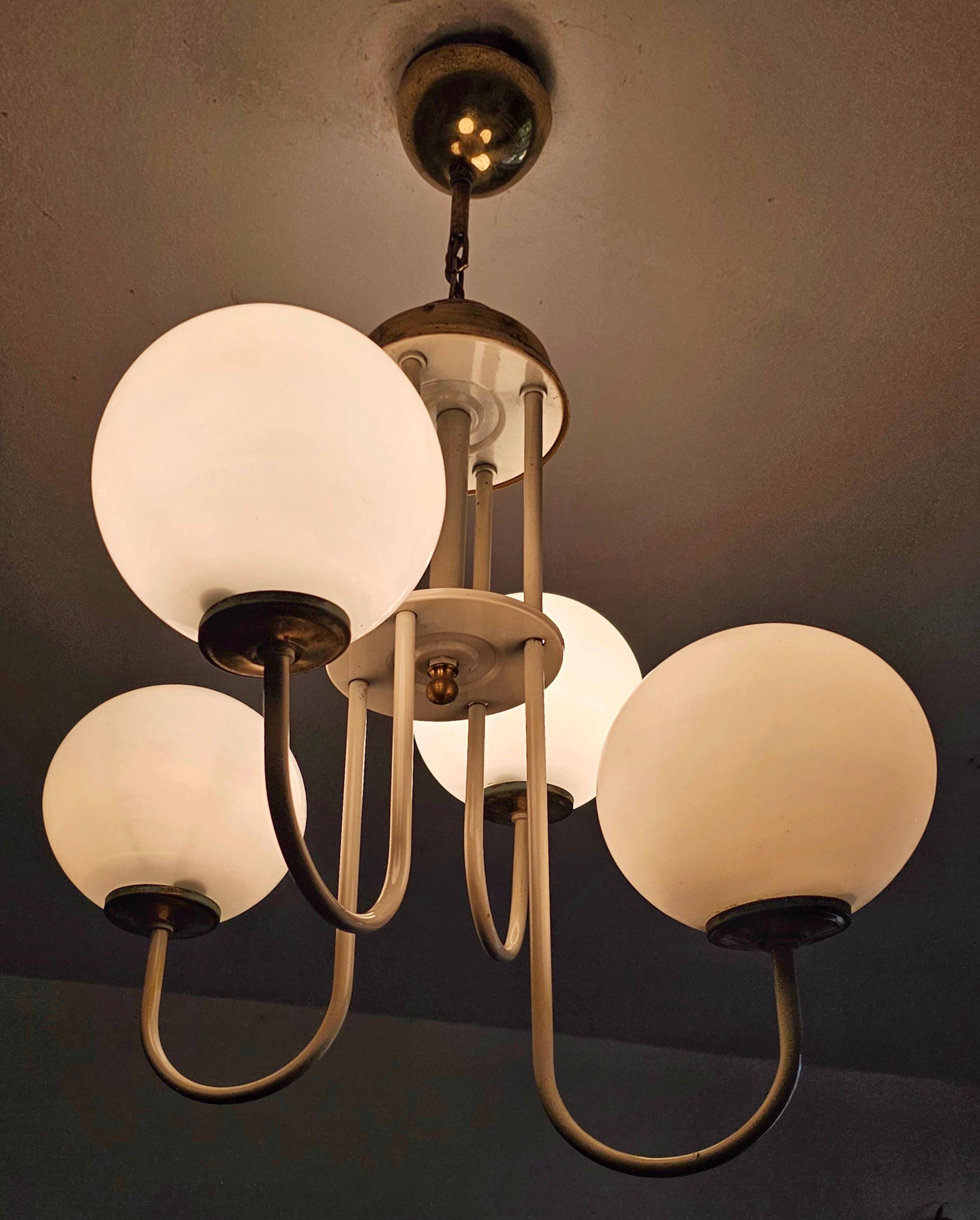 Mid-century modern chandelier with opaline glass balls.