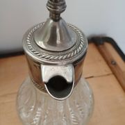 Antique pewter and glass carafe
