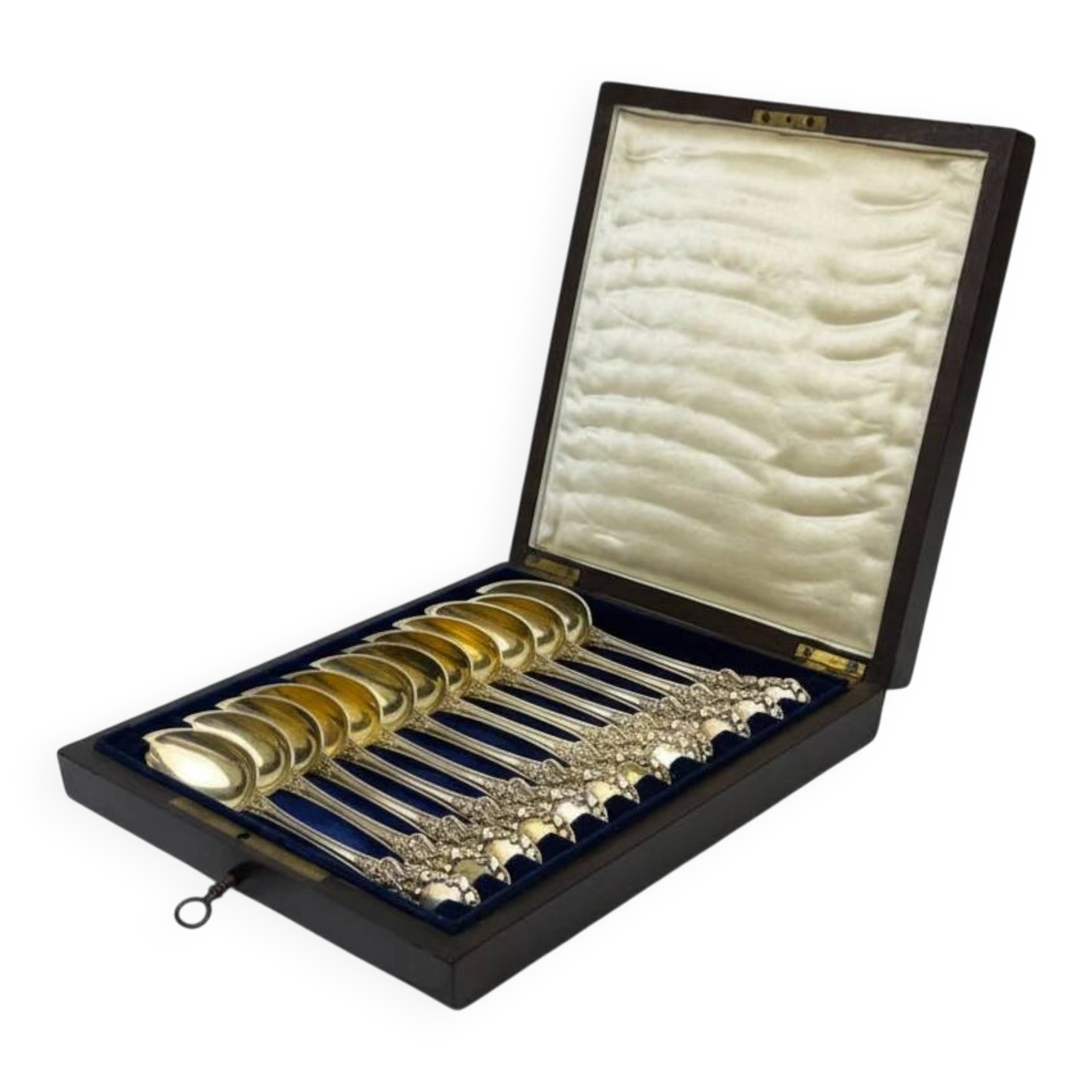 12 dessert spoons in vermeil, Minerva 19th century, blackened pear tree box