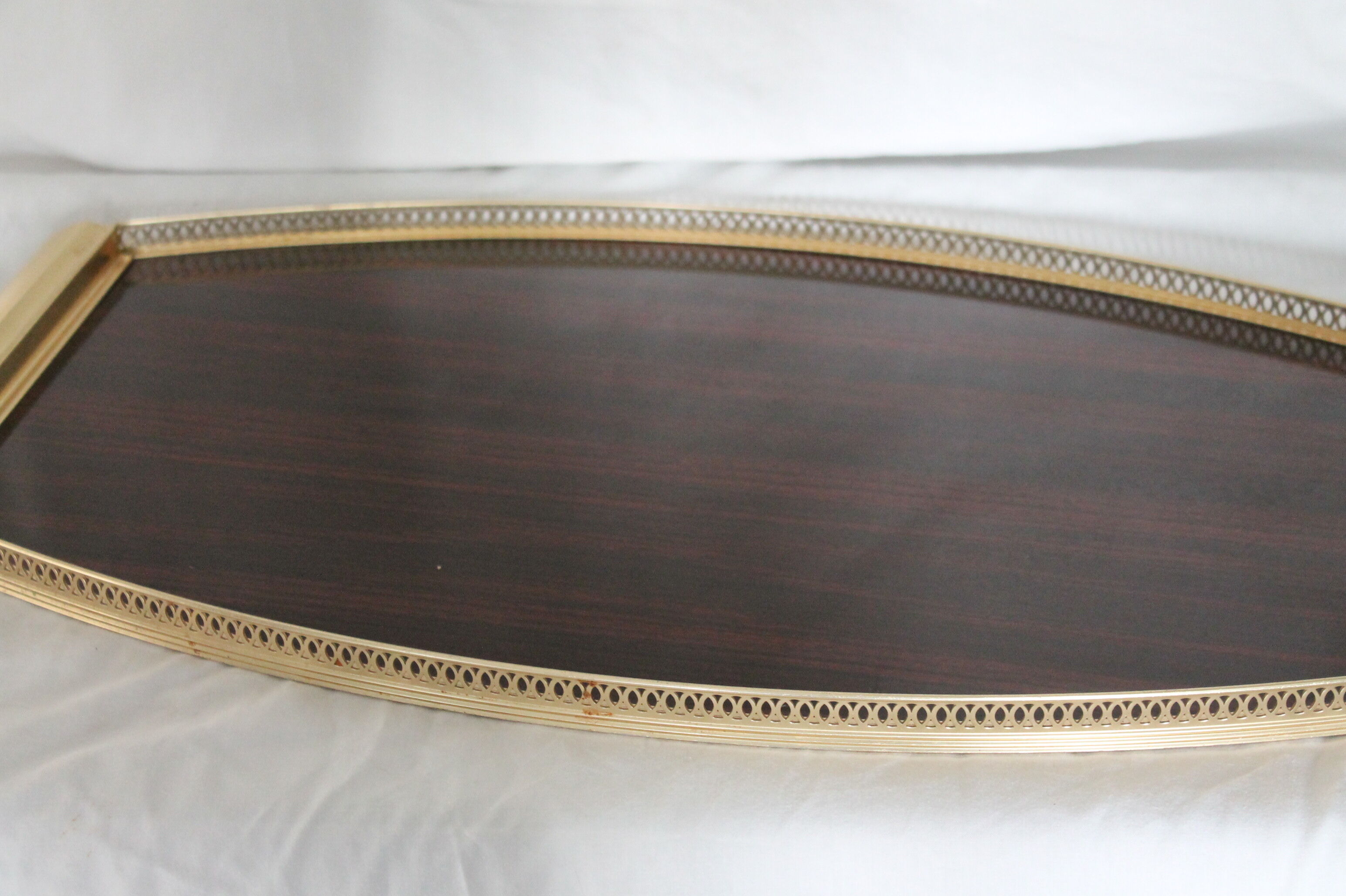 golden metal lace serving tray and wood veneer