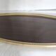 golden metal lace serving tray and wood veneer