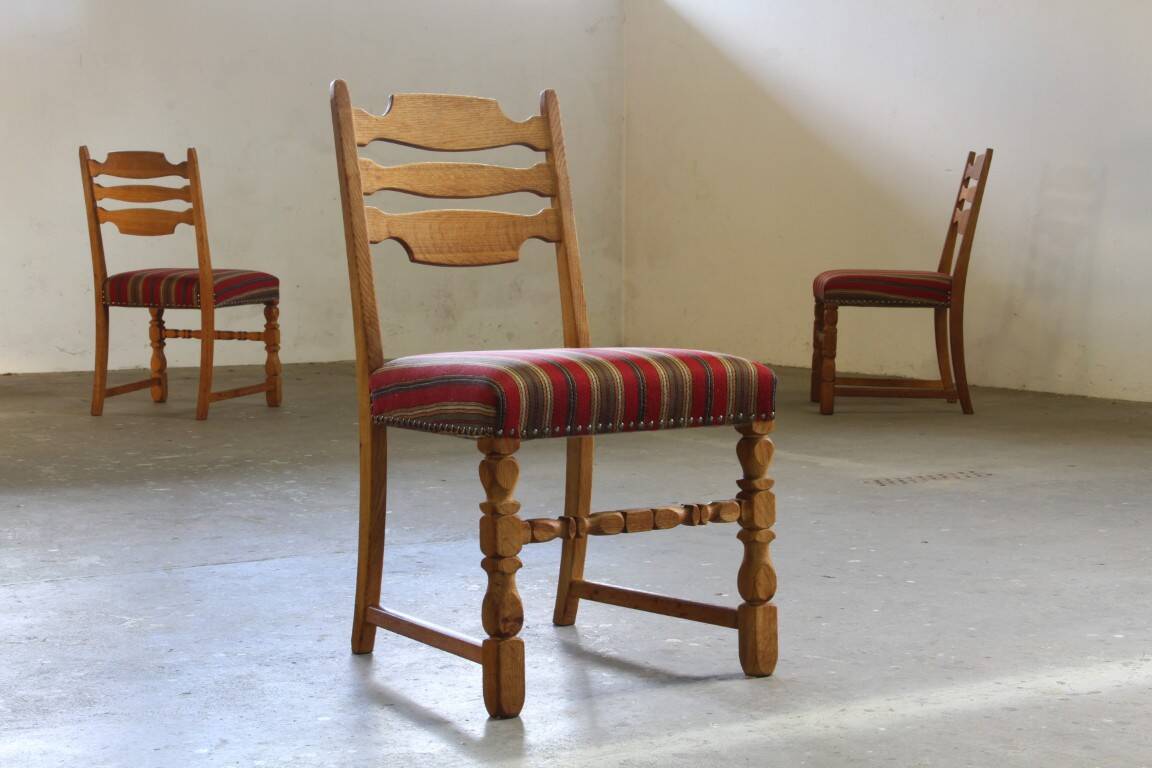 Vintage 1960s Danish farmhouse oak dining chairs in the style of Henning Kjærnulf