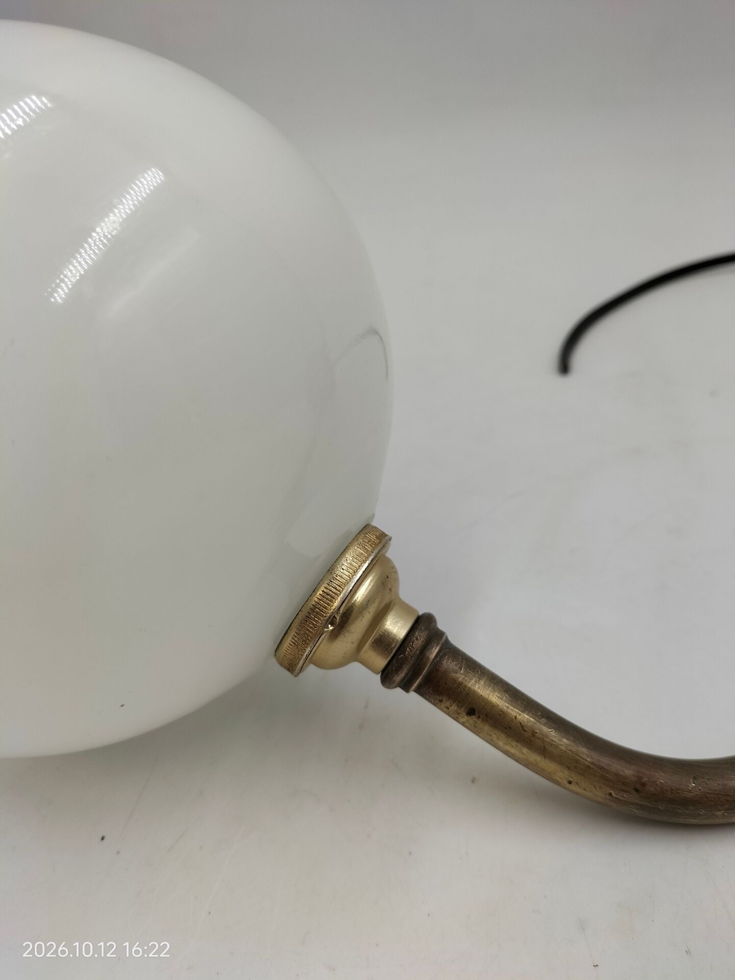Brass and glass wall light