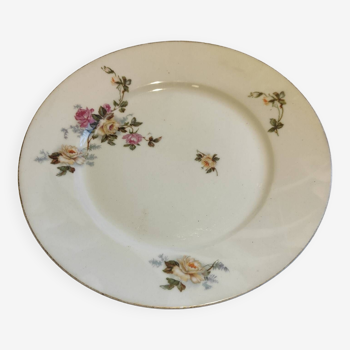 Old flowered earthenware plate