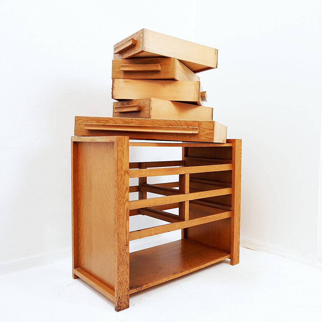 1960s wooden sewing cabinet with double-sided drawers