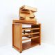 1960s wooden sewing cabinet with double-sided drawers
