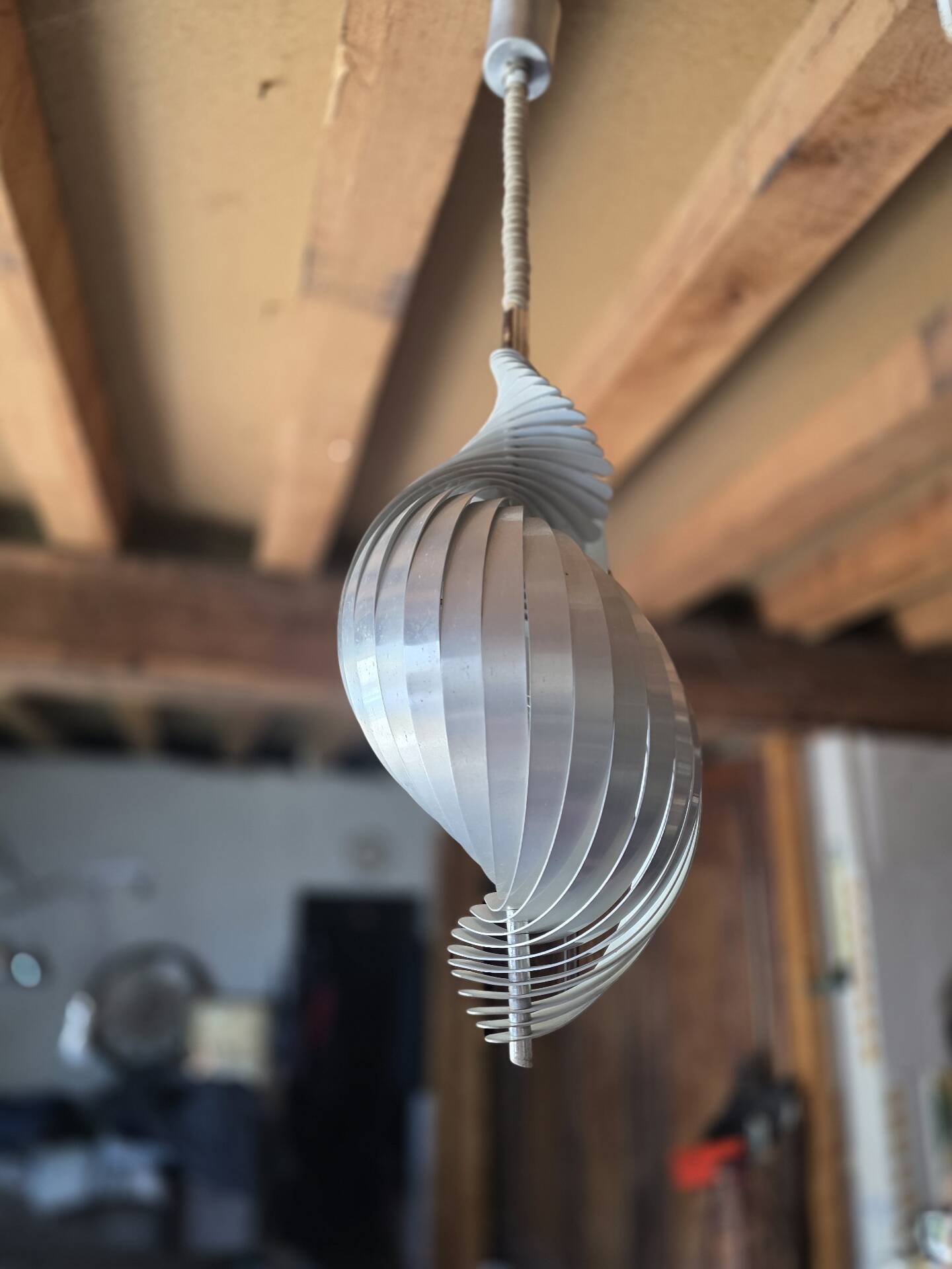 Henri Mathieu ceiling light from the 1970s in spiral aluminium.
