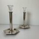 Pair of silver-plated metal candlesticks