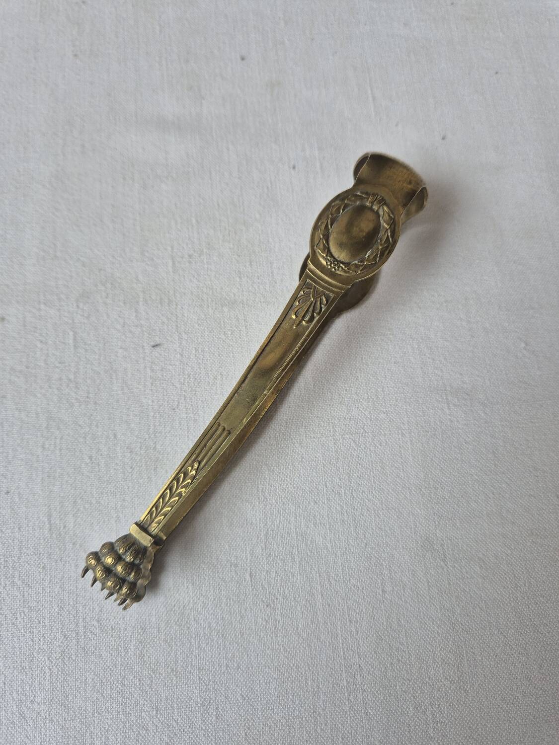 Antique brass sugar tongs