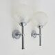 Pair of vintage Karl Lenz wall sconces. Chrome-plated metal and glass