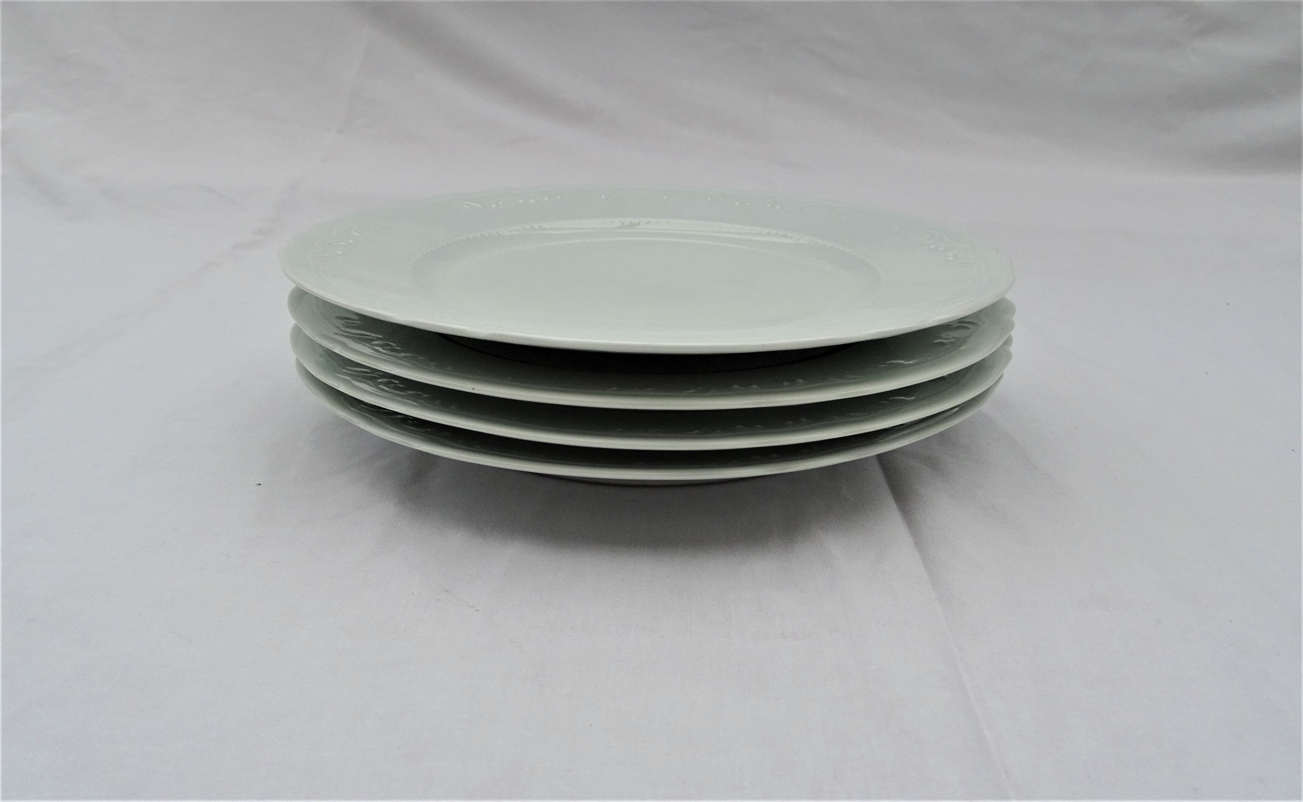 4 White de-serve plates Limoges