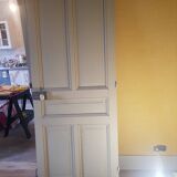 Large painted oak interior door with its hinges
