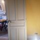 Large painted oak interior door with its hinges