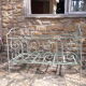Former child bed in wrought iron