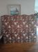 large antique headboard with 4 panels featuring Asian decor from the 1940s/50s