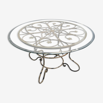 Wrought iron table and harmonious glass