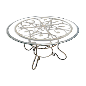 Wrought iron table and harmonious glass