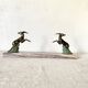 Art deco bookends in pink marble and spelters, antelopes