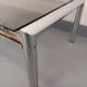 Vintage rectangular coffee table in smoked glass and chrome metal from the 1960s.