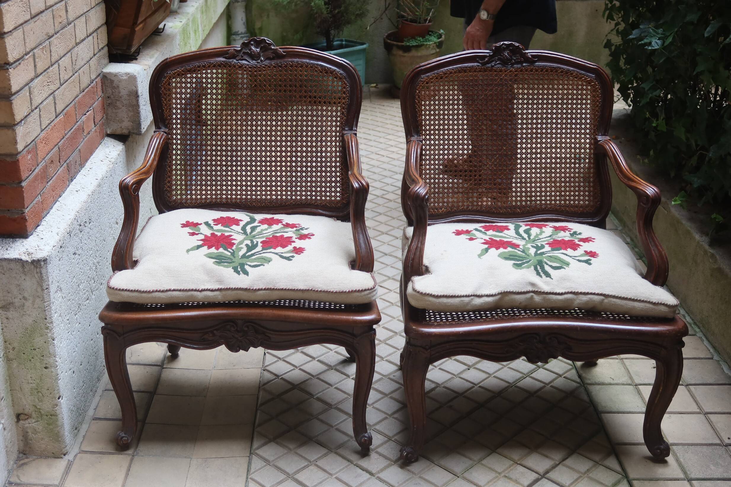 Pair of Louis XV style armchairs in wood and caning.