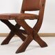 Pair of brutalist style chairs, in wood and leather.