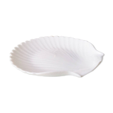 White ceramic dish shaped like 80s shells