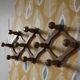 Vintage wooden ball accordion coat rack