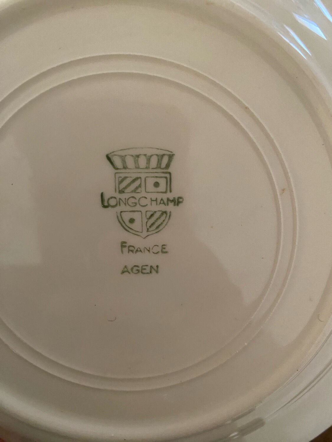 Flowered stamped dessert plates and matching ones.