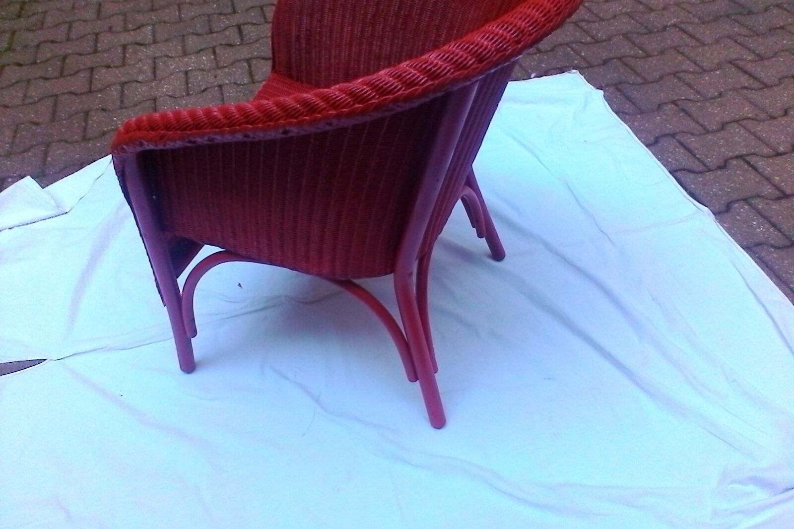 Vintage chair in red rattan