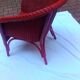 Fauteuil vintage en rotin rouge