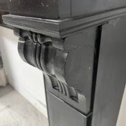 Napoleon III period fireplace with a black marble corbel. 19th century.