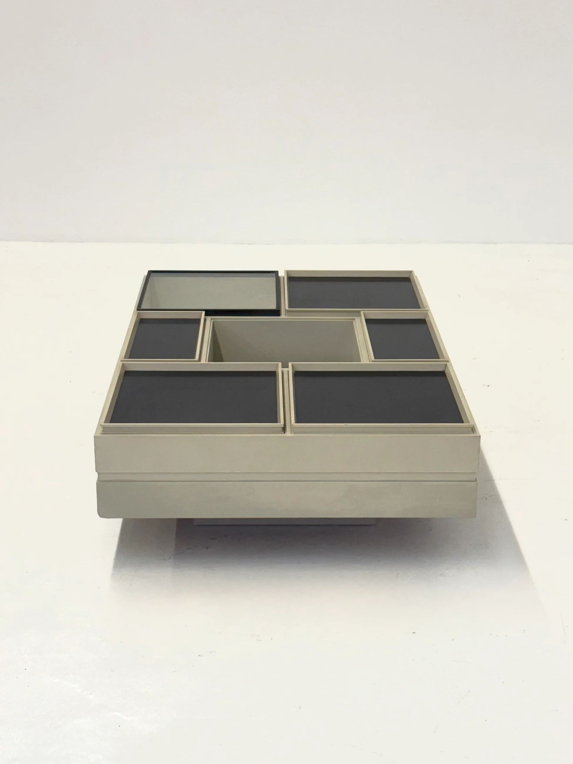 Modular white coffee table designed by Carlo Hauner for Forma