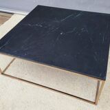 Coffee table or black marble and brass display "in its own juice"