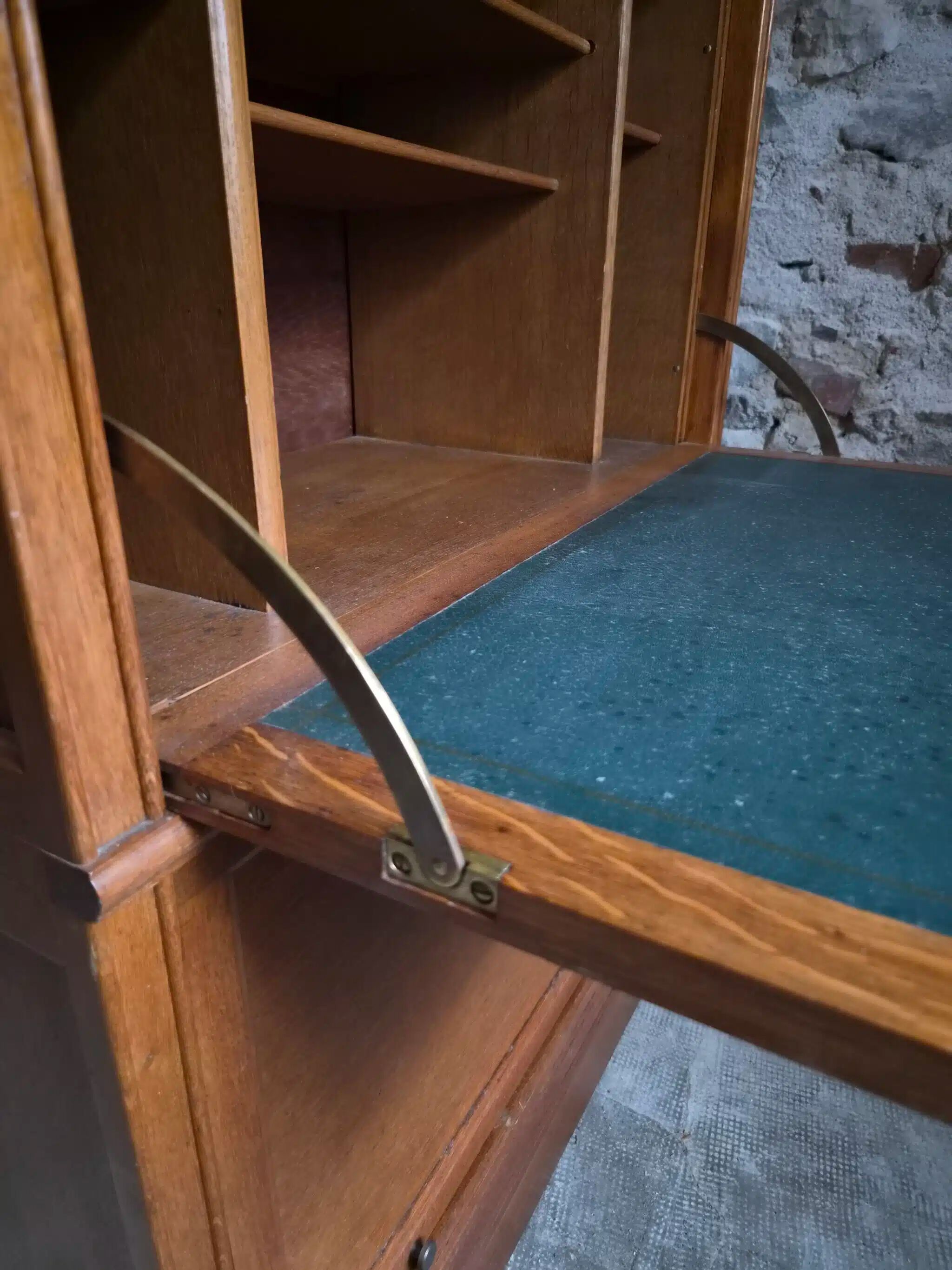 French modular secretary in oak with display case, 1950s.