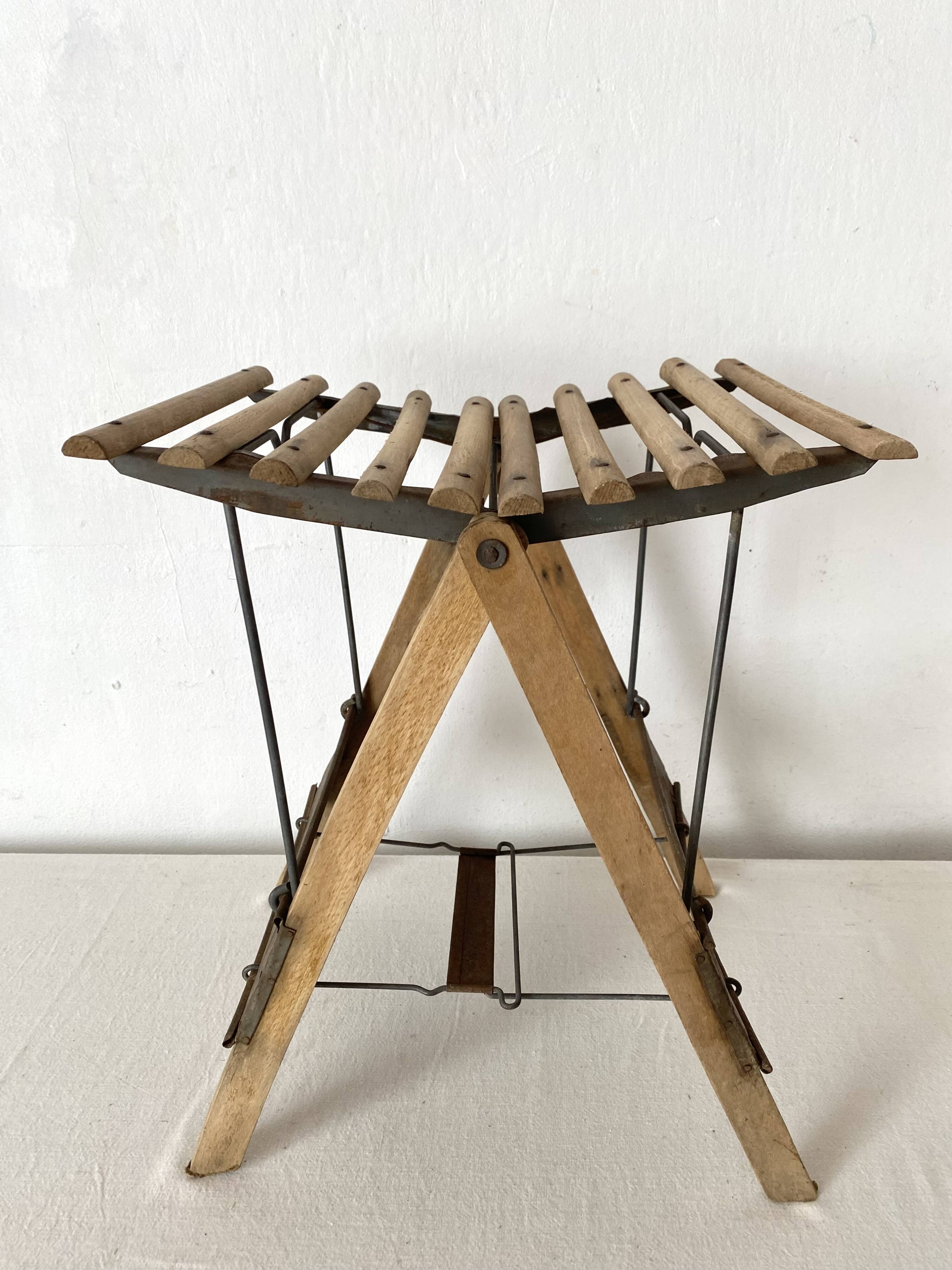 Antique folding stool with slats, plant holder