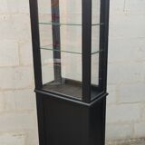 Old two-door shop showcase with black patina